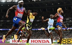Noah Lyles crosses the line to win the men's 200 metres final at the world championships