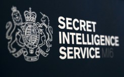 'Our virtual door is open to you,' MI6 chief Richard Moore tells potential spies