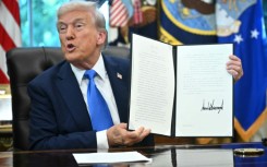 Trump signed orders increasing fees on H-1B visas and creating a new $1 million expedited 'gold' residency card