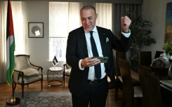 Head of the Palestine Mission to the UK, Husam Zomlot, celebrates after Starmer formally recognised a Palestinian state