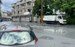A car stuck in mud in Hualien after the bursting of a barrier lake