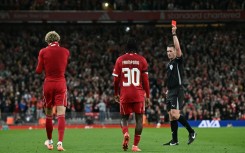 Liverpool forward Hugo Ekitike (L) will be suspended for the Premier League leaders' trip to Crystal Palace on Saturday