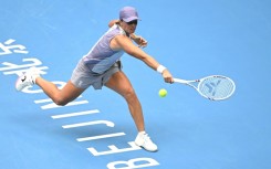 Poland’s Iga Swiatek hits a return to China’s Yuan Yue