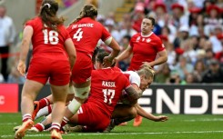 England No 8 Alex Matthews dives to score her second try in the Women's Rugby World Cup final against Canada at Twickenham