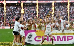 England captain Zoe Aldcroft lifts the Women’s Rugby World Cup trophy after a 33-13 win over Canada in the final at Twickenham