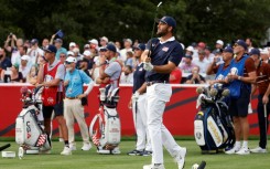 World number one Scottie Scheffler of the United States will be looking for his first win of the week when he faces Europe's Rory McIlroy in Ryder Cup singles
