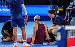 Carlos Alcaraz gets medical attention in Tokyo