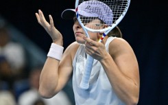 Iga Swiatek reacts during her match against USA’s Emma Navarro