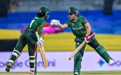 Bangladesh's Rubya Haider (R) and Nigar Sultana en route to leading their side to a comfortable opening win