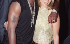 Sean Combs (L) and singer/actress Jennifer Lopez (R), seen in 1999, were romantically linked