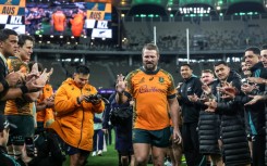 Australia's James Slipper walks down a guard of honour after playing his 151st and final Test