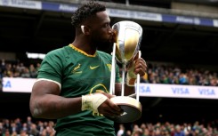 South Africa captain Siya Kolisi kisses the Rugby Championship trophy following a 29-27 win over Argentina at Twickenham that clinched the title