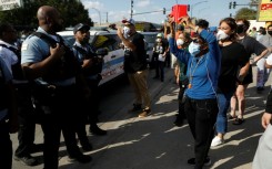 Protests at the aggressive law enforcement measures have turned tense in Chicago