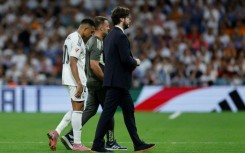 Real Madrid's Kylian Mbappe is in doubt for France's upcoming 2026 World Cup qualifying matches with a right ankle problem