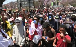 Protesters march in Madagascar capital despite president's promise to resign