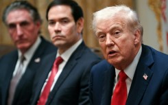 US President Donald Trump speaks alongside Secretary of the Interior Doug Burgum (L) and Secretary of State Marco Rubio (R) during a cabinet meeting in the Cabinet Room of the White House in Washington, DC, on October 9, 2025. Trump said Thursday he would try to go to Egypt for the signing of a Gaza ceasefire and hostage release deal between Israel and Hamas.