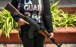 Thousands of Venezuelans have joined a civilian militia in response to President Nicolas Maduro's call for bolstering the cash-strapped country's defenses in the face of what it says is US aggression