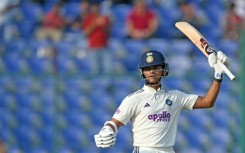India's Yashasvi Jaiswal celebrates after scoring 150 runs