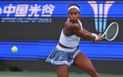 Coco Gauff hits a return to Italy’s Jasmine Paolini
