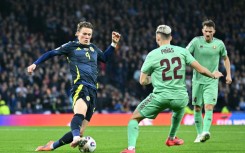 Scott McTominay (L) sealed an important victory for Scotland as he lashed home with his left foot on 84 minutes