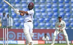 West Indies' John Campbell plays a shot