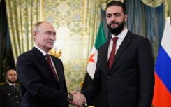 Putin greeted Sharaa warmly at the Kremlin