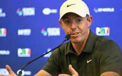 Northern Ireland's Rory McIlroy talks to reporters at the DP World Tour india Championship in Delhi
