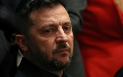 Ukrainian President Volodymyr Zelensky meets with unseen US President Donald Trump at the White House