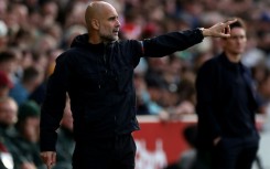 Pep Guardiola said he has "unfinished business" at Manchester City