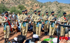 Pakistan troops at a fduneral for a colleague in border clashes with Afghanistan in Khyber Pakhtunkhwa province