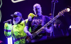 Fred Durst (L) and Sam Rivers from the US band "Limp Bizkit" perform in Bogota on March 21, 2024