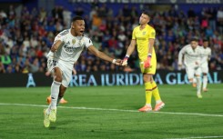 Real Madrid forward Kylian Mbappe (L) returned after an ankle problem kept him out of a France World Cup qualifier