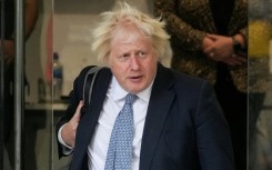 Britain's former prime minister Boris Johnson leaves the UK Covid-19 inquiry, in west London after giving evidence