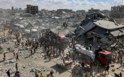 Aid trucks surrounded by desperate Palestinians in Gaza on October 12