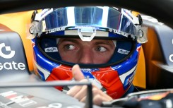 Red Bull Racing's Dutch driver Max Verstappen gives a thumbs up in the cockpit of his car before leading the second practice session of the Mexico City Formula One Grand Prix at the Hermanos Rodriguez racetrack