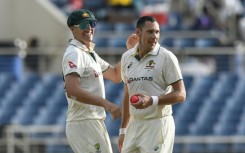 Australia captain Pat Cummins (L) is likely to be replaced by fellow quick Scott Boland (R) after pulling out of the first Ashes Test against England in November