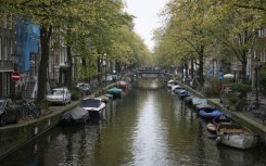 Tourists flock to Amsterdam to enjoy its stunning views