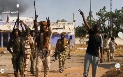 An image from an RSF handout video showing its fighters in Sudan's El-Fasher where they are accused of executing civilians