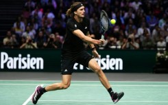 Alexander Zverev secured the crucial break at 5-5 in the third set against Camilo Ugo Carabelli to keep his title defence alive at the Paris Masters