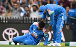 India’s Shreyas Iyer (L) lacerated his spleen taking a catch against Australia
