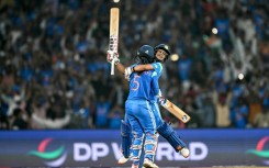 Jemimah Rodrigues (front) and Amanjot Kaur celebrate their epic run chase to make the Women's World Cup final