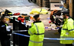 Paramedics medical equipment is pictured inside a police cordon at Huntingdon Station in eastern England