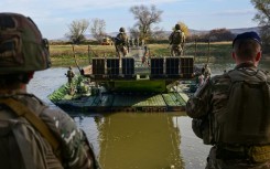 In the drill, a multinational brigade is conducting maneuvers and live-fire artillery and tank exercises, together with Romanian troops