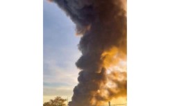 A UPS cargo plane with three crew members on board crashed near Louisville International Airport in Kentucky