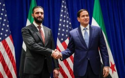 Syrian President Ahmed al-Sharaa meets top US diplomat Marco Rubio (R) on the sidelines of the United Nations General Assembly meeting in New York on September 22, 2025