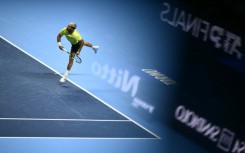 Carlos Alcaraz beat Alex De Minaur in the opening match at the ATP Finals tennis tournament in Turin