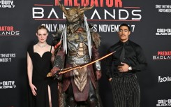 US actress Elle Fanning (L) and New Zealand actor Dimitrius Schuster-Koloamatangi star in 'Predator: Badlands'