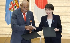 Sleep is for slackers: Japan's Prime Minister Sanae Takaichi (right)