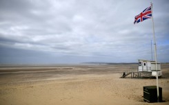 Millions of plastic pellets washed up on the beach at Camber Sands in East Sussex, southern England