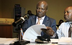 Lumbala (left) is accused of complicity in crimes against humanity